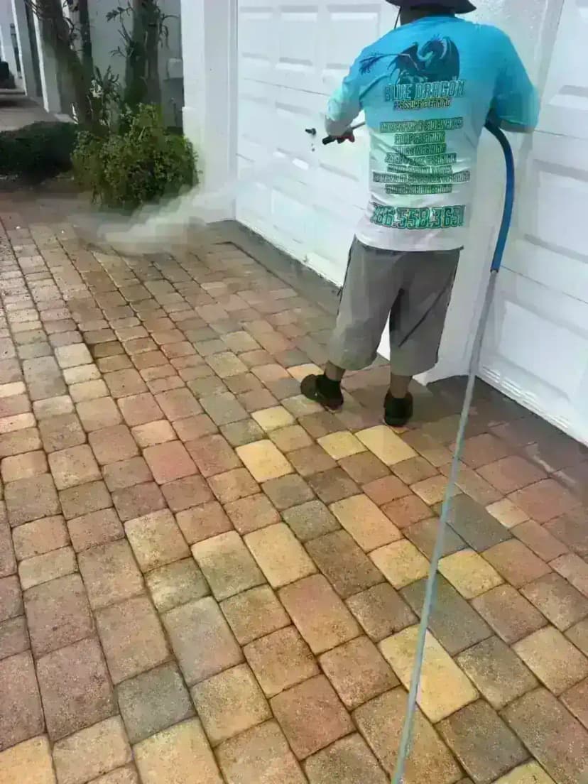 Blue Dragon professional technician performing pressure cleaning in Miami