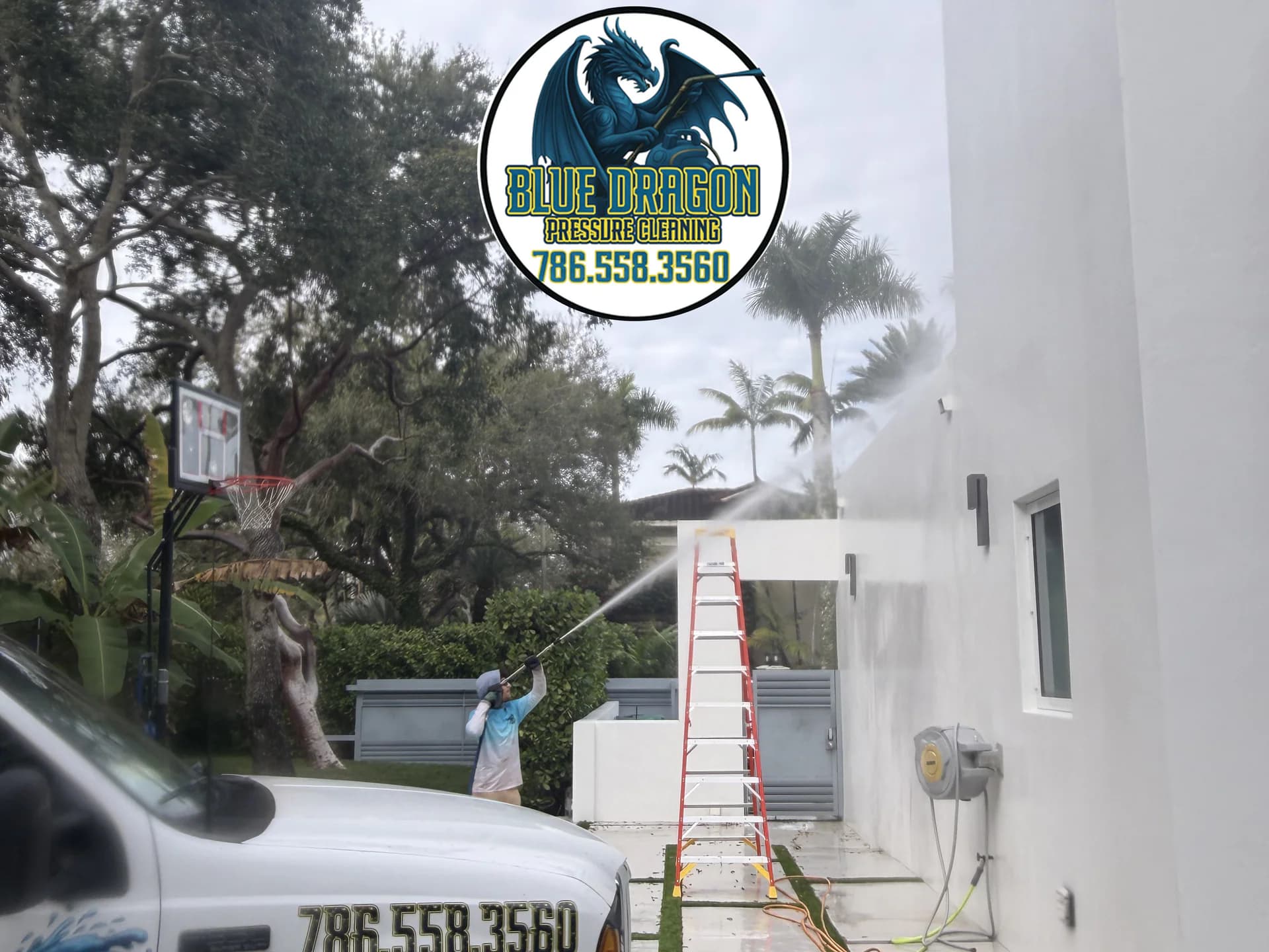 Blue Dragon professional technician performing pressure cleaning in Miami